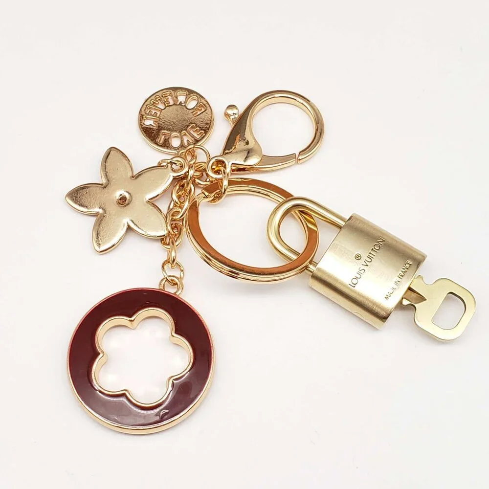 Louis Vuitton Authentic Gold Lock 🔒 Unbranded Flower Keychain Charm for Bags
